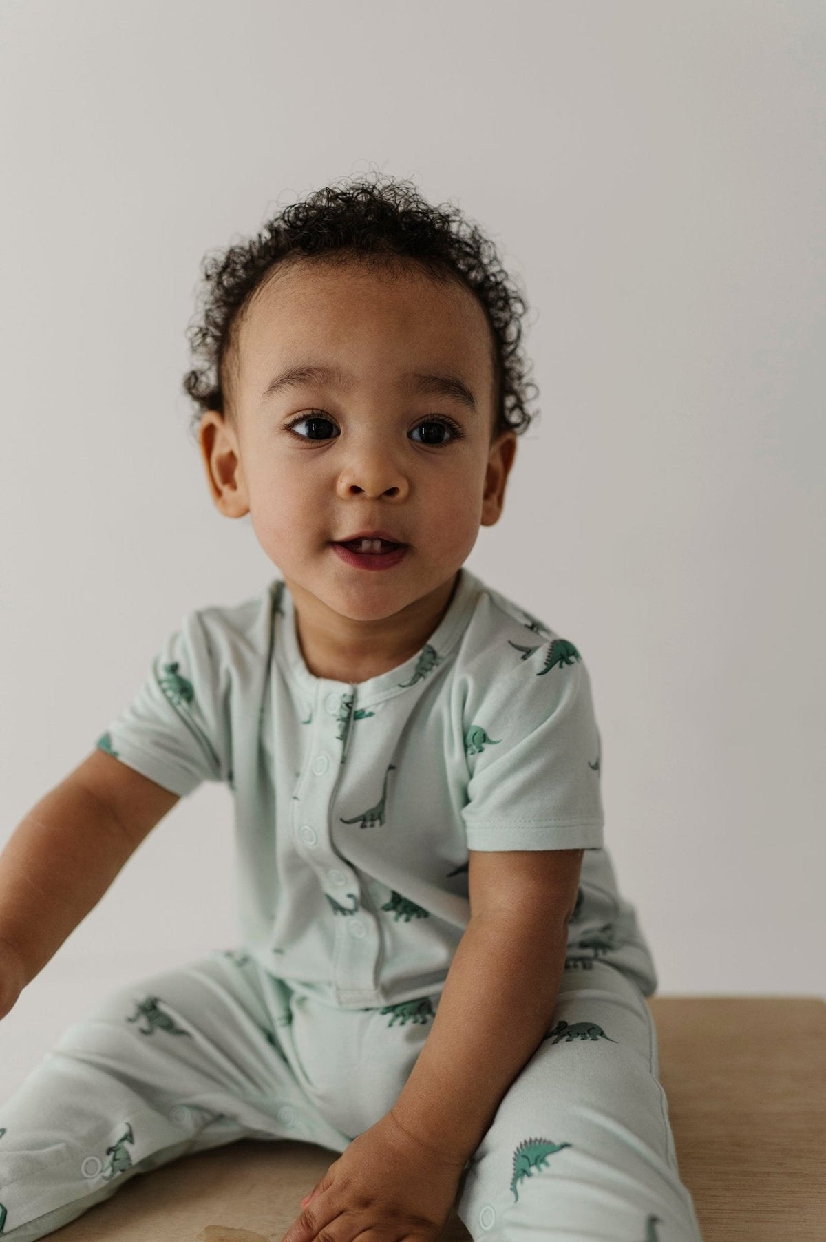 Baby Boy Short Sleeve Henley Romper in Dinosaur